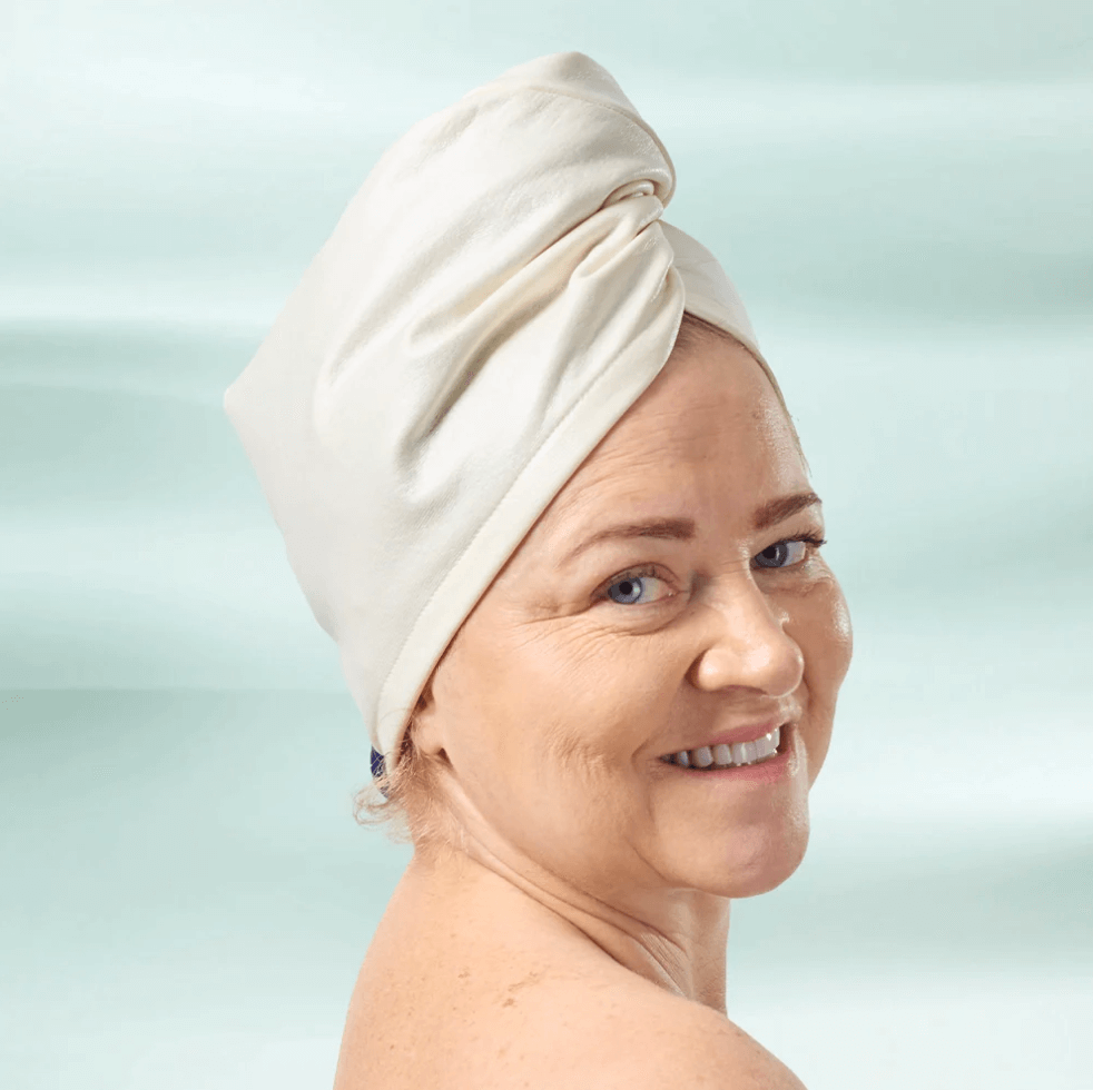 Image of woman wearing castor oil hair wrap