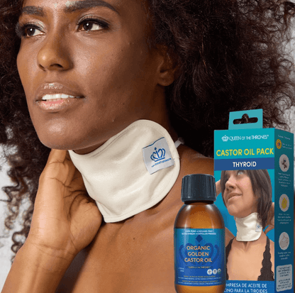 Image of black woman wearing thyroid pack with a bottle of castor oil